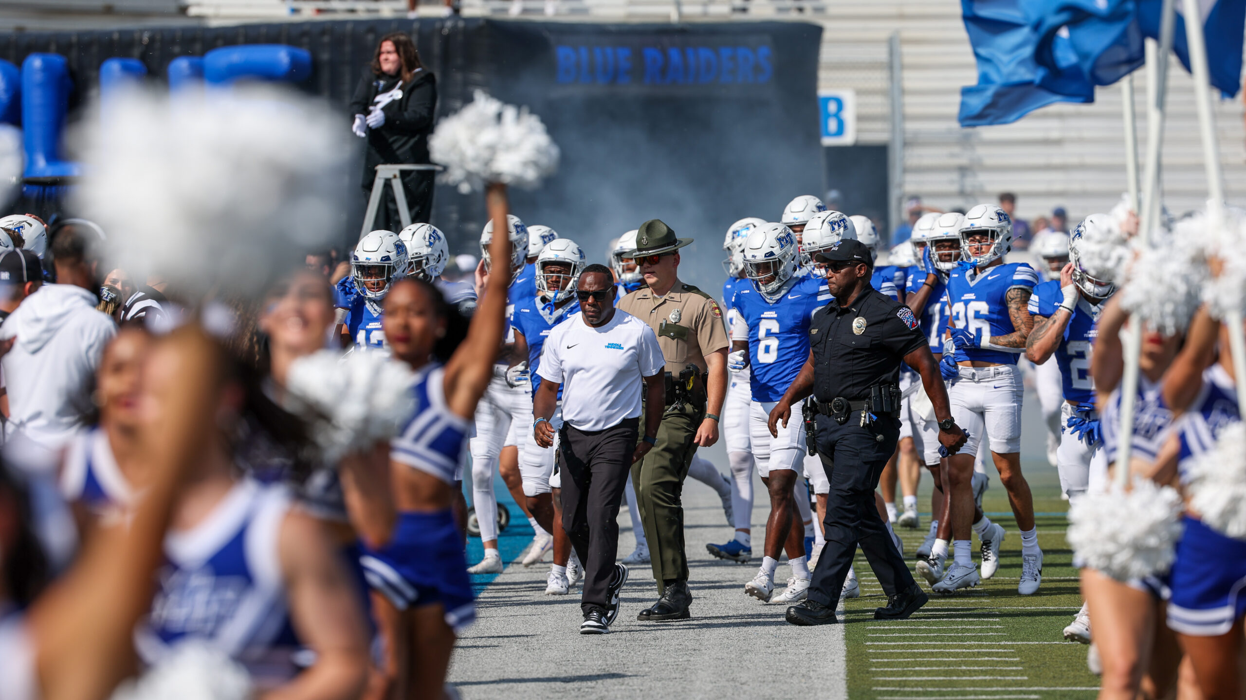 photo of Coach Mason and football team